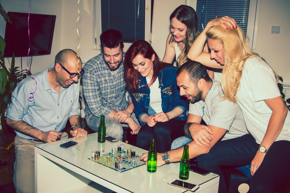 Adults night out board games ideas at indoor party. 
