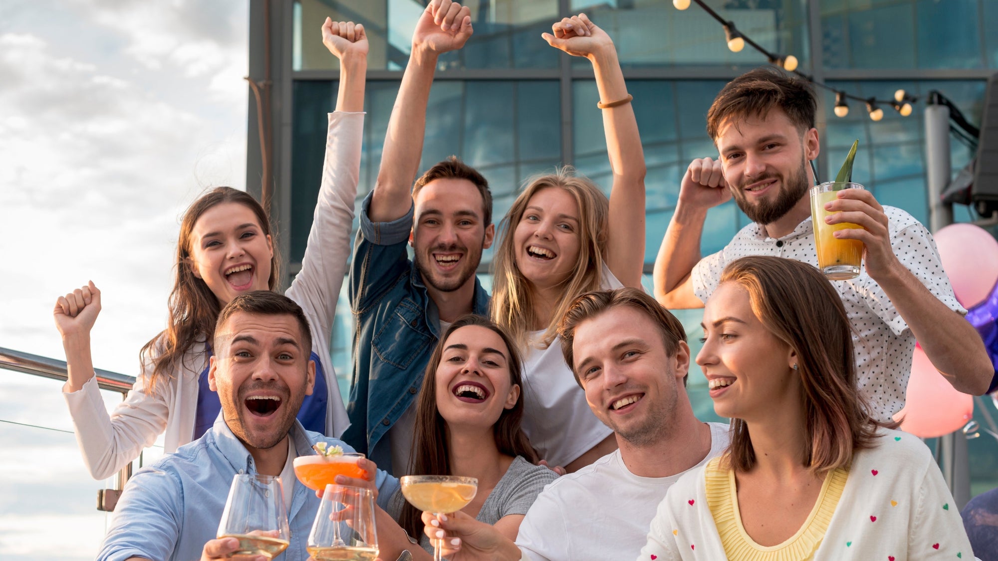 group of friends sharing drinks during weekend plans